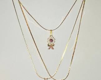 Vintage pendant necklaces including needlepoint pendant