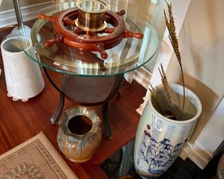 . . . ship's wheel/clock, floor vases