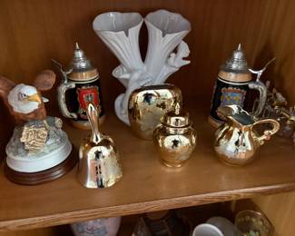 . . . steins, creamer and sugar, and eagle