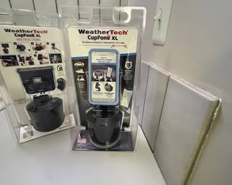 . . . two Weather Tech cup holders