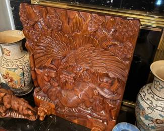 . . . rare double-sided hand carved panel