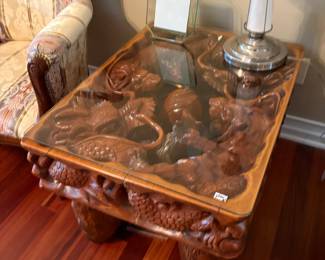 . . . one-of-a-kind hand carved accent table!