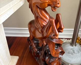 . . . large carved-wood horse