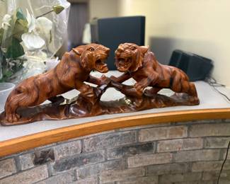 . . . carved wood tigers