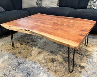 Live edge wood coffee table with black hairpin legs