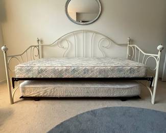 H1 - $150. Twin Size Trundle Bed. Iron Frame with brass accents. Includes linens and 2 clean twin mattresses if you'd like them! Measures 82.5" x 41" x 43" tall.