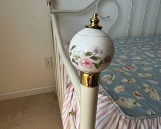 H1 - $150. Twin Size Trundle Bed. Iron Frame with brass accents. Includes linens and 2 clean twin mattresses if you'd like them! Measures 82.5" x 41" x 43" tall.