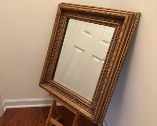 H9 - $60. Large Gold Framed Mirror. Measures 23.5" x 27.5". Can be hung either direction.