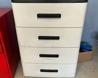 L28 - $5. 4 Drawer Plastic Storage Cabinet - with cracks on the side. Still works.