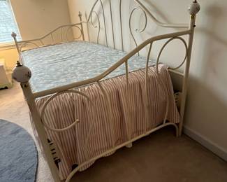 H1 - $150. Twin Size Trundle Bed. Iron Frame with brass accents. Includes linens and 2 clean twin mattresses if you'd like them! Measures 82.5" x 41" x 43" tall.
