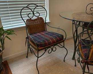 H13 - $125. Glass Top Table is 4' across x 30" tall. Includes 4 Iron framed chairs with cushioned seats. Glass has some minor scratches from use but nothing sharp and no big chips.