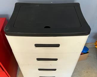 L28 - $5. 4 Drawer Plastic Storage Cabinet - with cracks on the side. Still works.