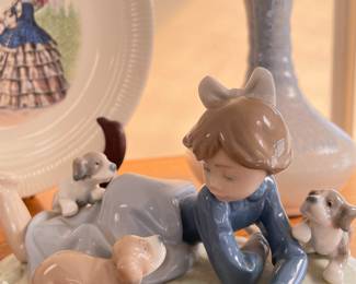 Lladro girl with puppies