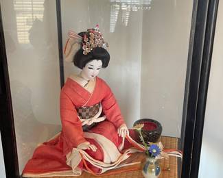 Japanese doll in case