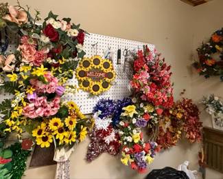 Assorted Decorative Wreaths and Floral Arrangements, Primarily Sunflower Themed
