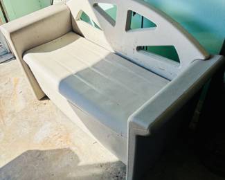 Outdoor bench with storage beneath.  Yard tools or beer?  It's all about choices.