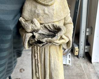 This Saint will not be flying away during the next hurricane. Dude is heavy.