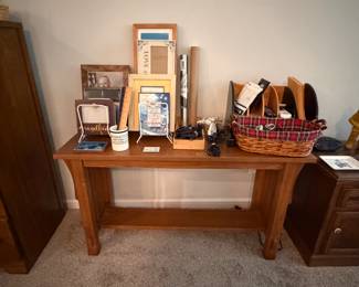 Oak sofa table. Lots of cords and office stuff