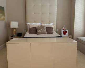 Leather Upholstered Queen Bed Frame. Measures 98" H x 85" L x 64" W. 