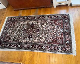 Asian Persian style rug with central medallion