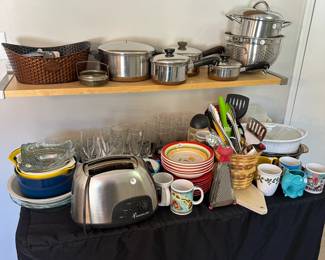 B17 - $40. Kitchen LOT. Toaster, Revereware Pots, Utensils, Bowls & Plates, Glasses, Coffee Mugs, 2 Serving dishes with lids. mixing bowls, pie plate, colandar.