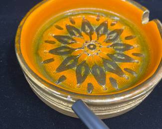 K9 - $75. MCM Italian pottery collection. Green, yellow, orange, brown colors. Orange starburst design. Bitossi. Created in Italy for Rosenthal Netter. Candleholder, ashtray, and cigar ashtray. Great for trinket dishes. Some flea bites on ashtrays. Candleholder in excellent condition.