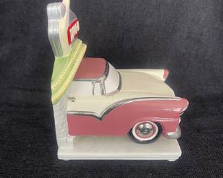 K39 - $15. Single Drive-In bookend. Some crazing. Measures 6”w x 6”d x 7.25”t.