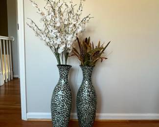 B7 - $10 Pair of Decorative Vases. Measure 24" tall. Paper mache feeling with inlaid design.