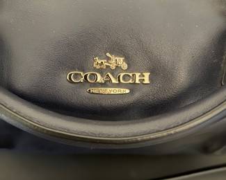 K3 - $45. Coach Peyton Bennett mini satchel leather handbag, navy blue. Excellent condition. Measures 10”w x 4”d x 6”t.