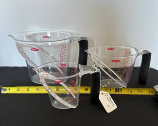 S36 - $15. Set of 3 OXO Plastic Measuring Cups with pour spouts.