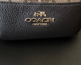 K2 - $45. Coach Signature Phoebe Canvas shoulder bag, in brown/tan. Like new condition. Measures 12”w x 6”d x 10”t.