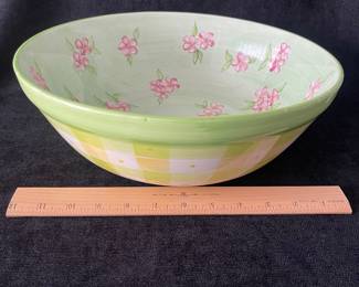 K48 - $25. Large vintage bowl. Designed by Tracy Porter and hand painted. Fun green and yellow checkered design with pink flowers. Some crazing on the underside. Measures 14”w x 5”t.