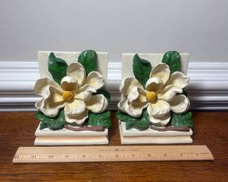 K40 - $25. Vintage Full color magnolia CBK bookends.