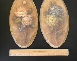 K21 - $20. Pair of vintage floral wall plaques featuring textured hydrangea and rose art. Each Measures 6”w x 12”t.