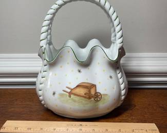 K44 - $35. Signed Handpainted USA ceramic basket with bees and honey motif. Measures 7”w x 5”d x 10”t.