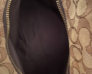 K2 - $45. Coach Signature Phoebe Canvas shoulder bag, in brown/tan. Like new condition. Measures 12”w x 6”d x 10”t.