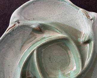 K45 - $30. Unsigned Dolphin pottery serving/catch-all dish. Measures 12” x 12”.