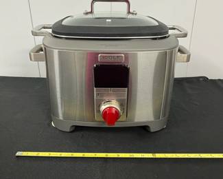S7 - $500. Wolf Programmable 6 in 1 Multi Function Cooker with Red Knob. Model #WGSC100S. Functions as a slow cooker, sear/sauté pan, rice cooker, and sous vide machine.