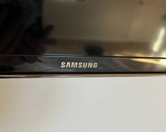 B13 - $50. Samsung 50" TV. UN50HU6950F. Mfg. Oct. 14. Wall mount not included but we have the base.