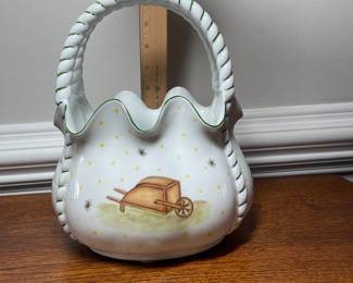 K44 - $35. Signed Handpainted USA ceramic basket with bees and honey motif. Measures 7”w x 5”d x 10”t.