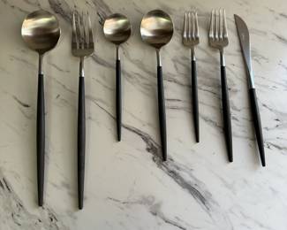 S54 - $600. Cutipol Goa Flatware. 48 Pc Set.