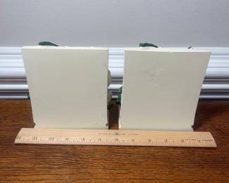 K40 - $25. Vintage Full color magnolia CBK bookends.