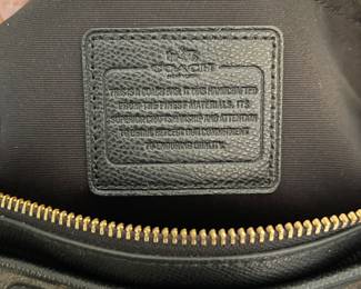 K1 - 75. Coach Morgan Signature Satchel, in dark brown. Like new condition. Measures 14w x 6”d x 9”t.