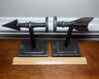 K41 - $25. Cast iron arrow bookends.