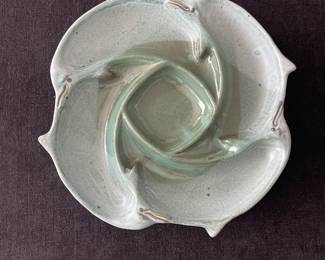 K45 - $30. Unsigned Dolphin pottery serving/catch-all dish. Measures 12” x 12”.