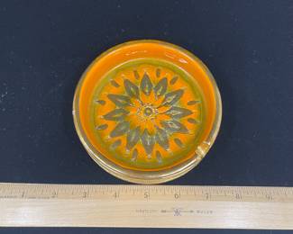 K9 - $75. MCM Italian pottery collection. Green, yellow, orange, brown colors. Orange starburst design. Bitossi. Created in Italy for Rosenthal Netter. Candleholder, ashtray, and cigar ashtray. Great for trinket dishes. Some flea bites on ashtrays. Candleholder in excellent condition.