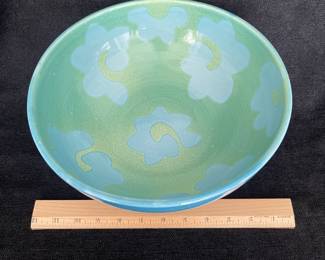 K47 - $30. Vietri Ceramic Italian pedestal bowl with blue and green design. Measures 12”w x 5.75”t.