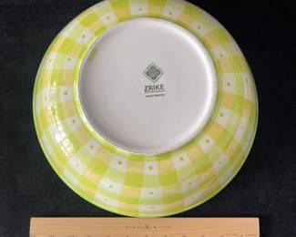 K48 - $25. Large vintage bowl. Designed by Tracy Porter and hand painted. Fun green and yellow checkered design with pink flowers. Some crazing on the underside. Measures 14”w x 5”t.