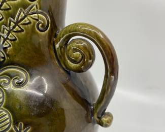 K6 - $50. Vintage olive green pottery vase. Signed Anna Grandina. Measures 6”w x 5”d x 12”t.