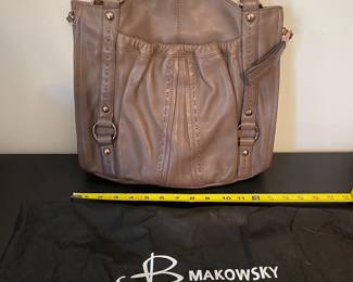 K5 - $45. B Makowsky brown leather shoulder bag with gold tone hardware. Exceptionally Soft heavy leather with expandable bottom. Never used. Includes dust bag. Measures 13”w x 12”t. Mostly stays collapsed but expands to 4.5” to accommodate anything you need to carry.